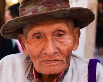 Old man in temple, Rangoon